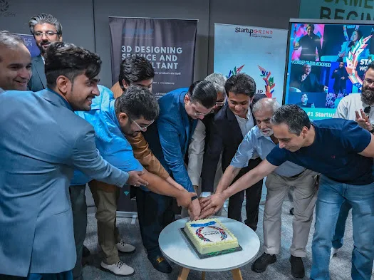 Guests cutting the cake together